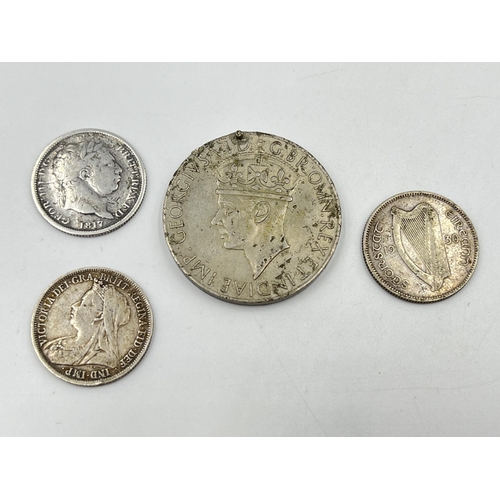 2371A - Four items, one 92.5% silver 1817 shilling, one 92.5% silver 1899 shilling, one 75% silver 1930 Iris... 