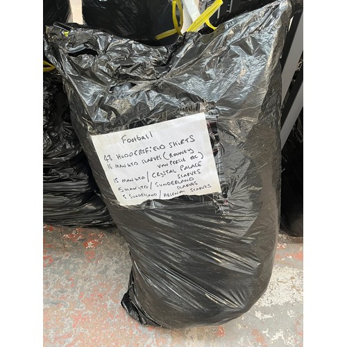 966A - Three bags containing a large quantity of sports scarves and t-shirts to include Huddersfield, Engla... 