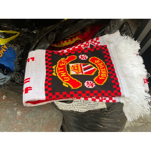 966A - Three bags containing a large quantity of sports scarves and t-shirts to include Huddersfield, Engla... 