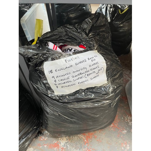 966A - Three bags containing a large quantity of sports scarves and t-shirts to include Huddersfield, Engla... 