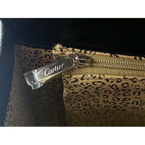 428 - A boxed Cartier Panthère black leather handbag with coin purse, dust cover and guarantee card - no. ... 