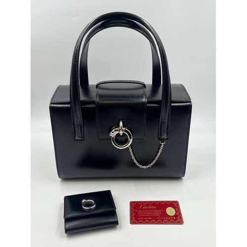 428 - A boxed Cartier Panthère black leather handbag with coin purse, dust cover and guarantee card - no. ... 