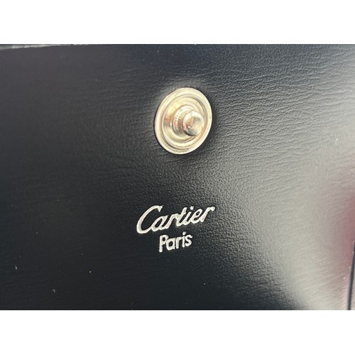 428 - A boxed Cartier Panthère black leather handbag with coin purse, dust cover and guarantee card - no. ... 