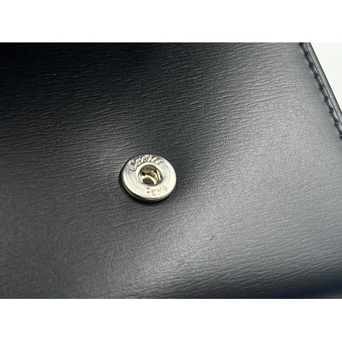 428 - A boxed Cartier Panthère black leather handbag with coin purse, dust cover and guarantee card - no. ... 