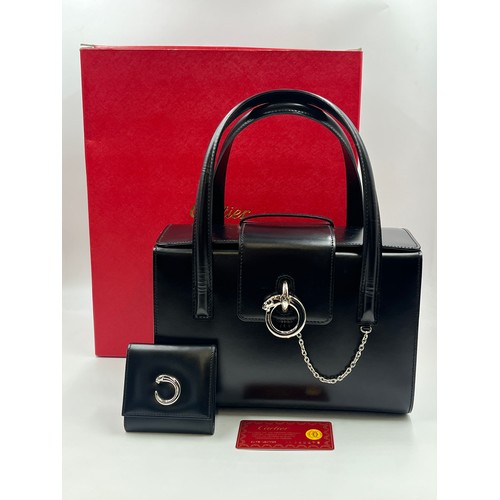 428 - A boxed Cartier Panthère black leather handbag with coin purse, dust cover and guarantee card - no. ... 