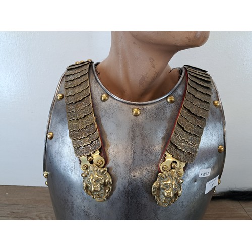 528 - A 19th century Belgian Cuirassier's breast plate and helmet