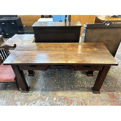 25 - An Arts & Crafts style reclaimed pine writing desk - approx. 76cm high x 160cm wide x 65cm deep