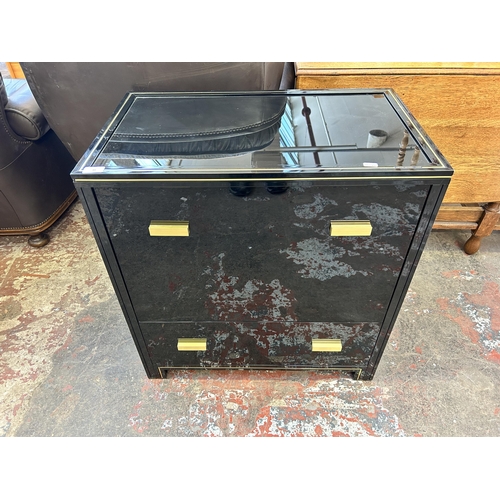 48 - A Pierre Vandel of Paris black lacquered metal and glass top media cabinet - approx. 74cm high x 70c... 