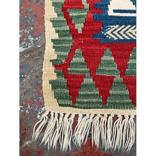 44A - A Kilim hall runner rug - approx. 224cm x 68cm