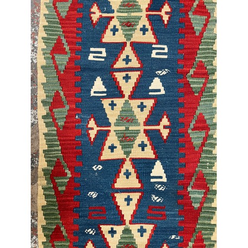 44A - A Kilim hall runner rug - approx. 224cm x 68cm