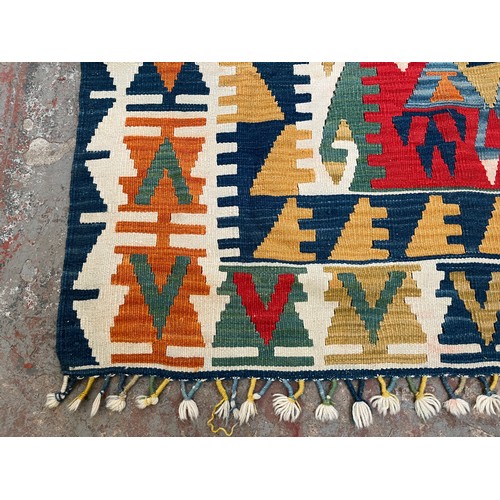 44B - A Kilim rug - approx. 235cm x 142cm