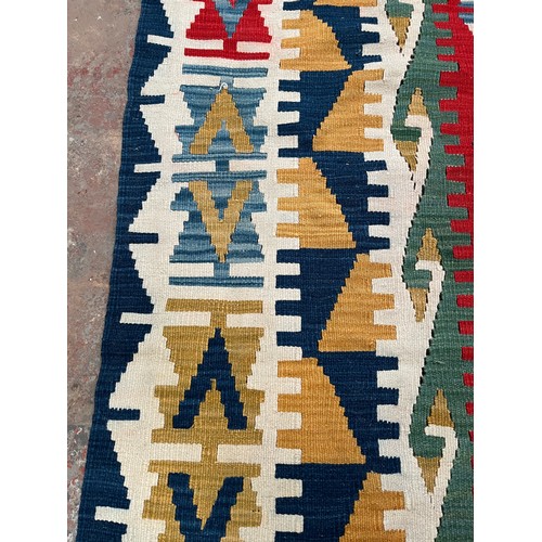 44B - A Kilim rug - approx. 235cm x 142cm