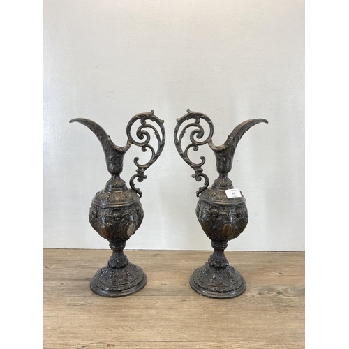 332 - A pair of 19th century cast spelter ewers - approx. 45cm high