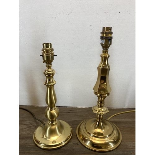 335 - A collection of brassware to include horse brasses, table lamps, candlesticks, Bentima mantel clock ... 