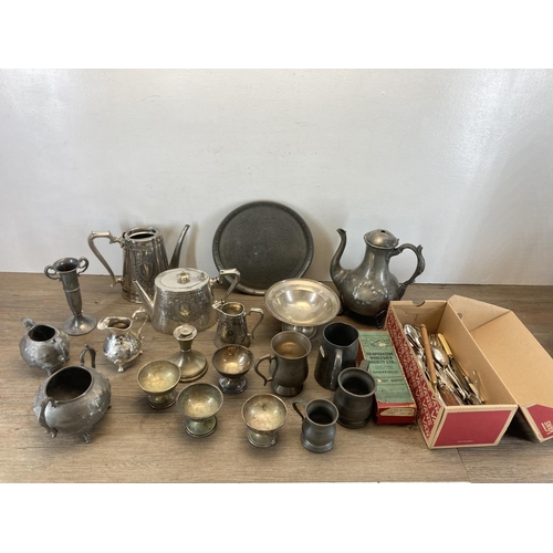 339 - A collection of antique metalware to include cutlery, Victorian four piece tea and coffee set, pewte... 