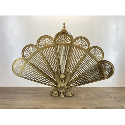 348 - A 19th century style brass peacock fire screen