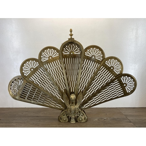 348 - A 19th century style brass peacock fire screen