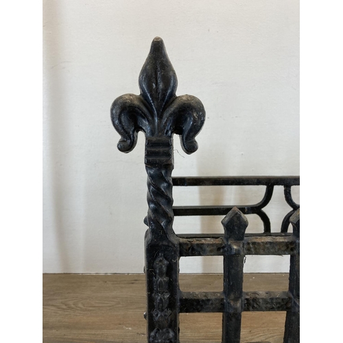 349 - Two vintage fireside accessories, one 19th century style cast iron fire grate - approx. 45cm high x ... 