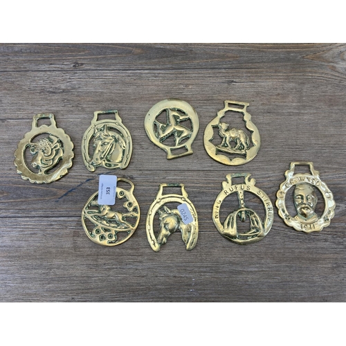 353 - A collection of metalware, three brass shell cases, one vintage AA badge serial no. 4A92447 and a co... 