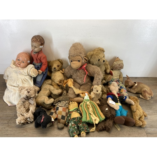 359 - A collection of mid 20th century and later soft toys and dolls to include A Dean's Rag Book & Co Ltd... 