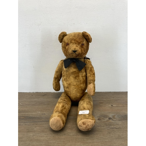 361 - A mid 20th century articulated teddy bear - approx. 53cm high