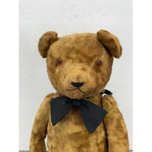 361 - A mid 20th century articulated teddy bear - approx. 53cm high