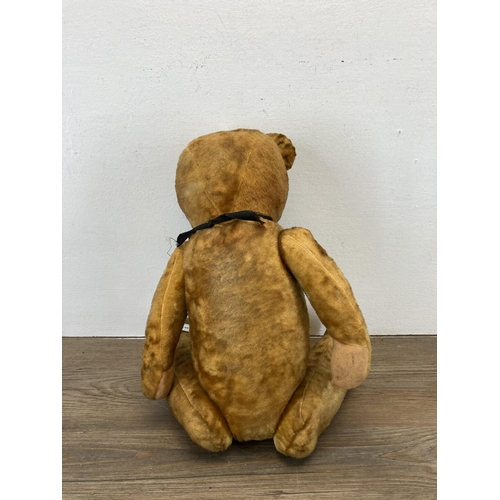 361 - A mid 20th century articulated teddy bear - approx. 53cm high