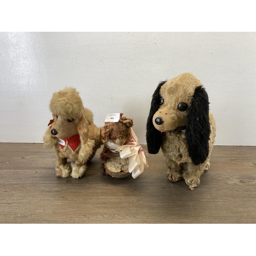 362 - Three mid 20th century soft toys, one clockwork poodle, one automaton drumming bear and one battery ... 