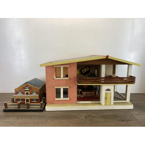 370 - Two items, one mid 20th century scratch built two storey doll's house and one scratch built doll's h... 