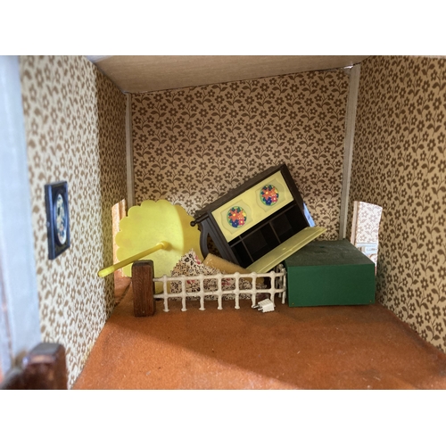 370 - Two items, one mid 20th century scratch built two storey doll's house and one scratch built doll's h... 