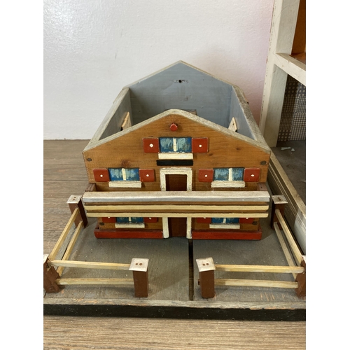 370 - Two items, one mid 20th century scratch built two storey doll's house and one scratch built doll's h... 