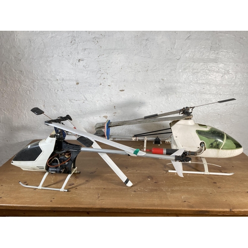 372 - Two radio controlled nitro helicopters