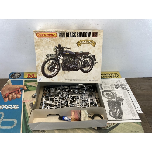 374 - Two Matchbox items, one motorised motorway slot car set and one Vincent series C black shadow model ... 