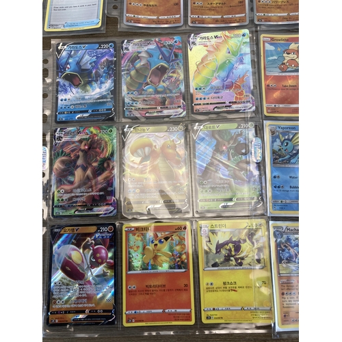 377 - A collection of Pokémon cards to include Pikachu, Machamp etc.