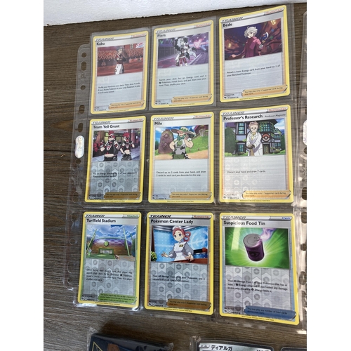 377 - A collection of Pokémon cards to include Pikachu, Machamp etc.