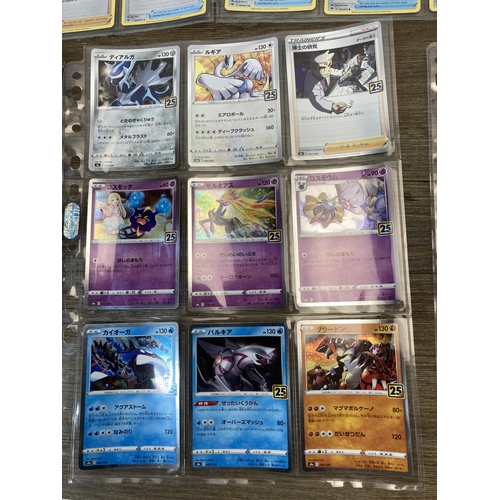 377 - A collection of Pokémon cards to include Pikachu, Machamp etc.