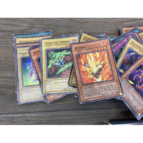 392 - A collection of 1996 and later Yu-Gi-Oh trading cards to include Salamandra, Gaia The Fierce Knight,... 