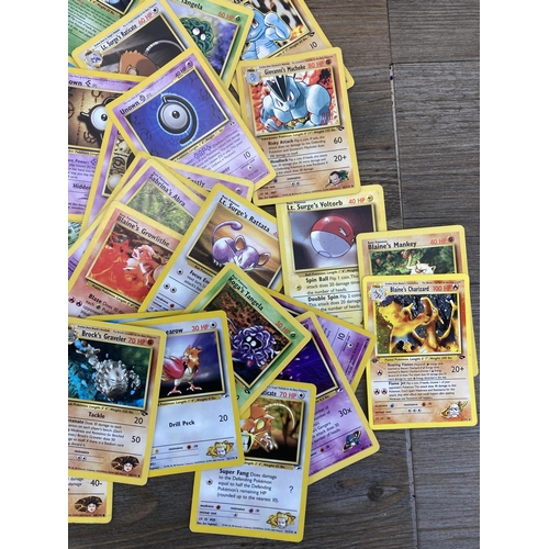 393 - A collection of 1990s Pokémon cards to include Blaine's Charizard, Blaine's Mankey, Brock's Zubat et... 