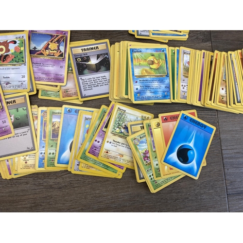 394 - A collection of 1990's and later Pokémon cards to include Eevee, Sentret, Gust of Wind etc.