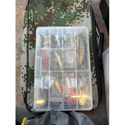 790 - A large collection of fishing tackle to include lures, floats, ready made rigs, bait tubs, hooks etc... 