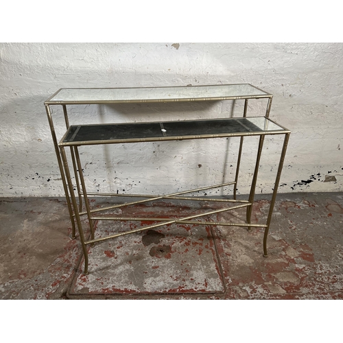 104 - Two Maison Bagues style metal bamboo effect and glass top console tables - largest approx. 80cm high... 