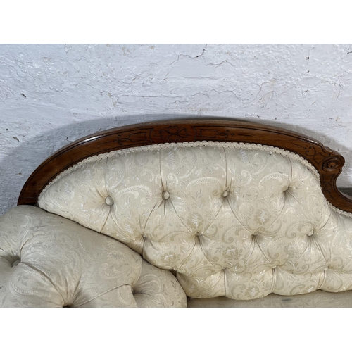 107 - A Victorian carved walnut and fabric upholstered chaise longue - approx. 82cm high x 65cm wide x 195... 