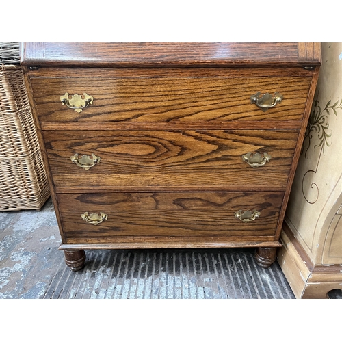 108 - A mid 20th century oak bureau - approx. 100cm high x 74cm wide x 37cm deep