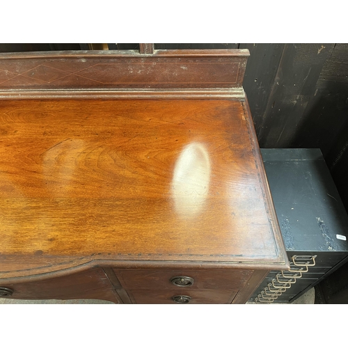 119 - An Edwardian inlaid mahogany bow fronted dressing table - approx. 82cm high x 113cm wide x 53cm deep