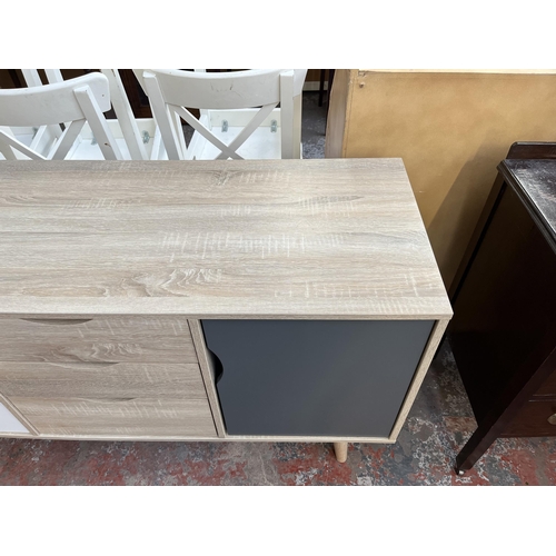 126 - An LPD Scandi oak effect and painted sideboard - approx. 77cm high x 125cm wide x 45cm deep