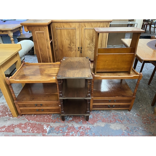 132 - Four pieces of furniture, two yew wood side tables, one walnut three tier side table and one yew woo... 