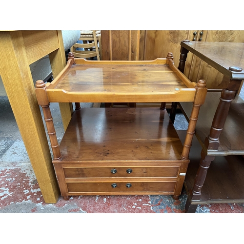 132 - Four pieces of furniture, two yew wood side tables, one walnut three tier side table and one yew woo... 