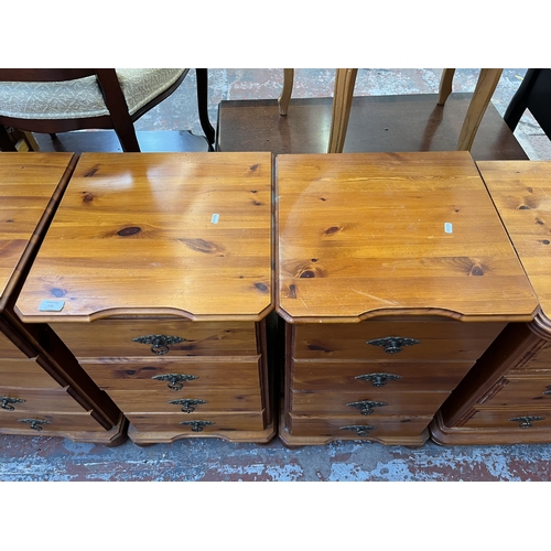 136 - A pair of pine bedside chests of drawers - approx. 77cm high x 45cm wide x 45cm deep