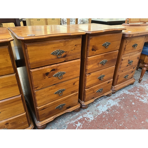 136 - A pair of pine bedside chests of drawers - approx. 77cm high x 45cm wide x 45cm deep
