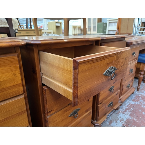 136 - A pair of pine bedside chests of drawers - approx. 77cm high x 45cm wide x 45cm deep